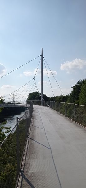 File:Bridge crossing the waters.jpg